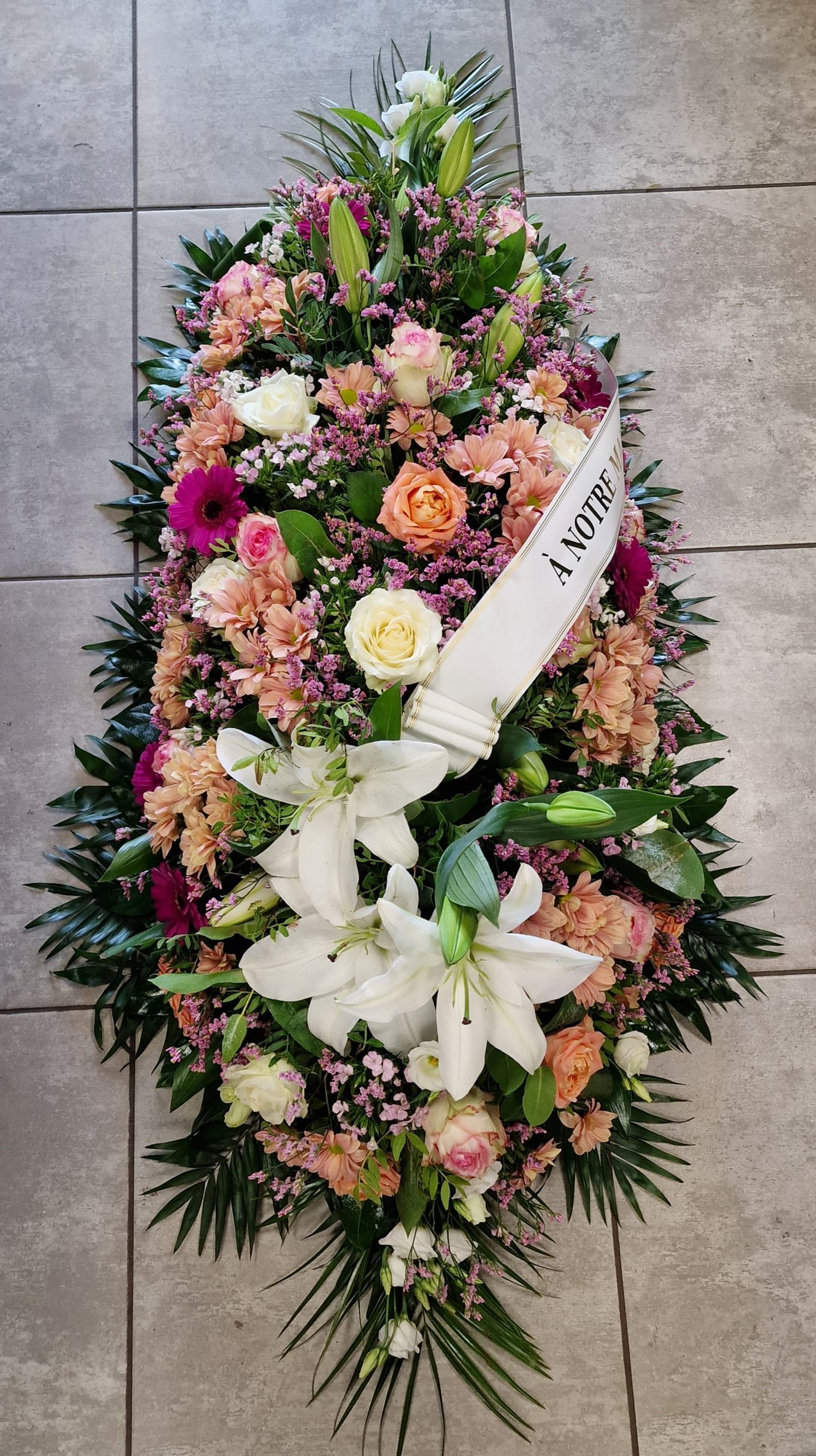 Gerbe deuil décès dessus de cercueil fleurs Fleuriste Sète