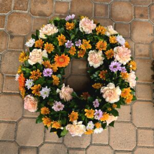 Couronne de fleurs tons orangés